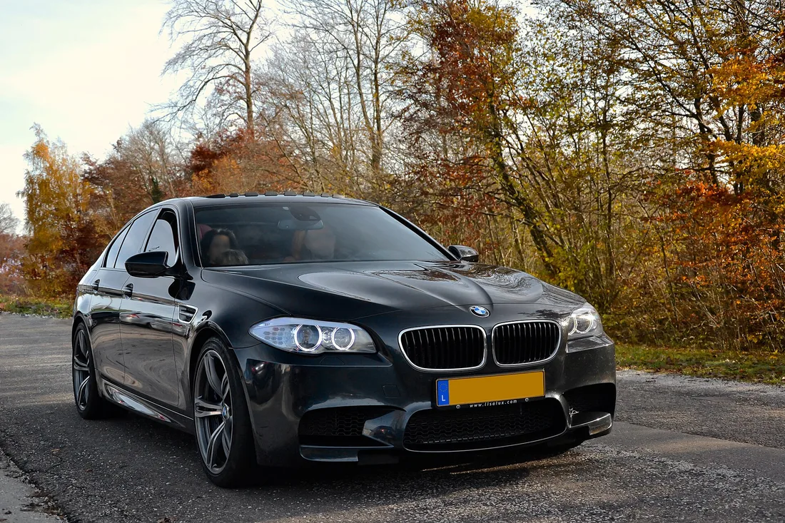 Black BMW M5 (F10) with M wheels